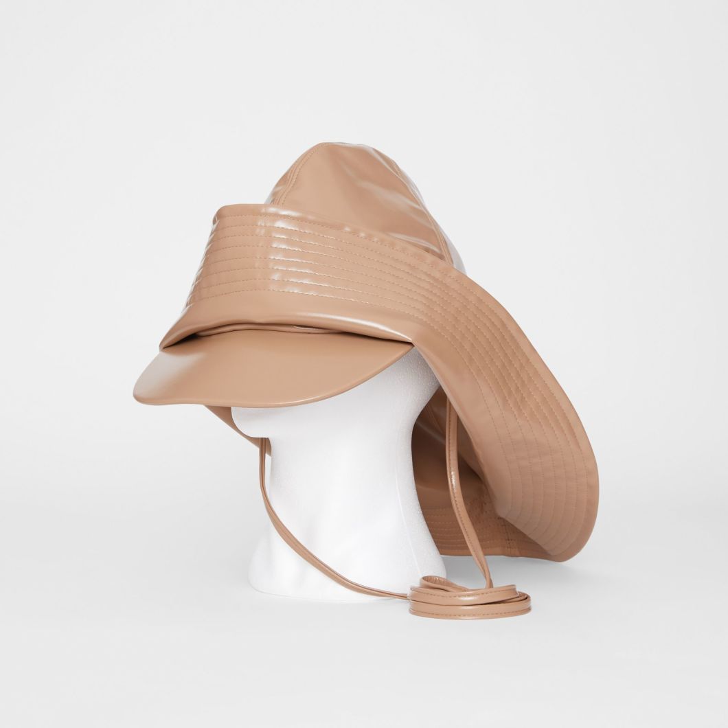 Rain Hat Shaped with a Peak Complete with a High-Shine Finish Water Proof