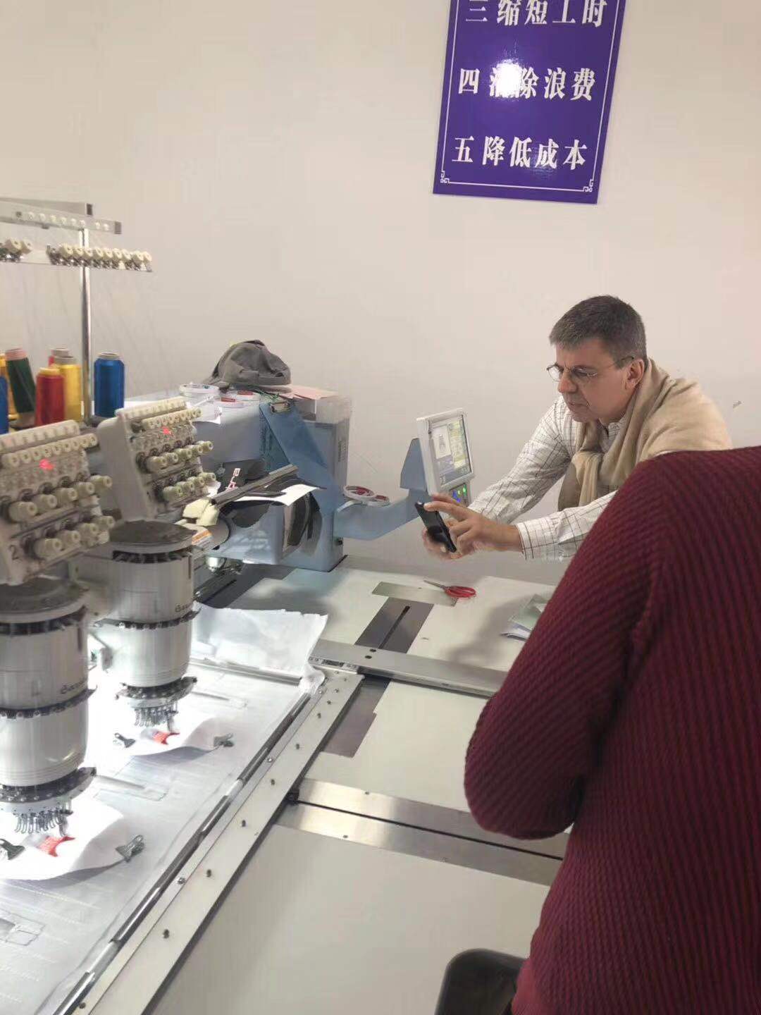Client is very interested in our baseball cap embroidery machine.